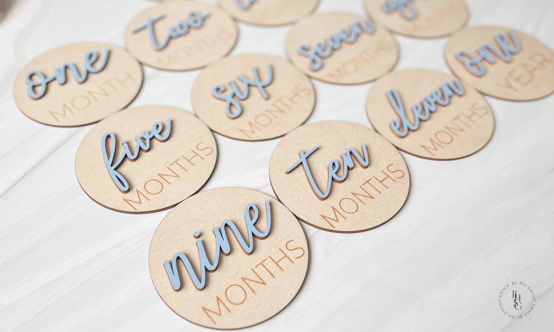 3D Wooden Monthly Milestone Discs With Light Pink Letters