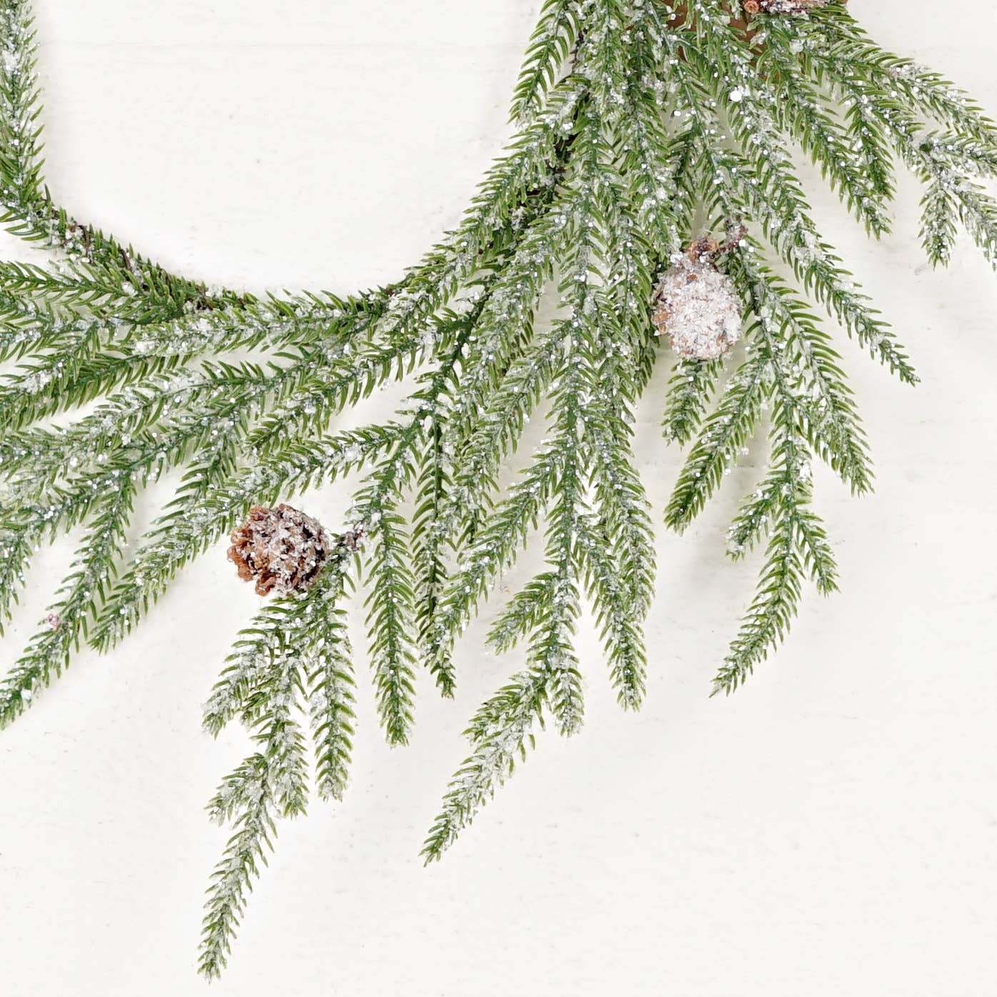 Snowy Soft Touch Norfolk Pine with pinecones - wreath